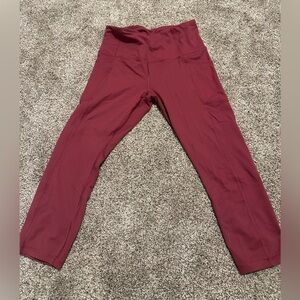 Great condition Reebok maroon leggings. Size medium
